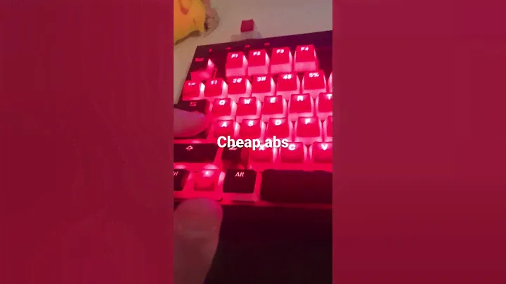ABS vs PBT keycaps (lubed Cherry reds)